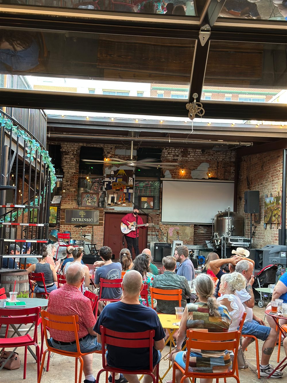 Bob Davis performing live on stage at Intrinsic Brewery